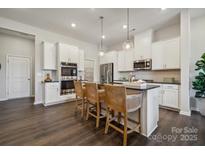 Modern kitchen with stainless steel appliances and island at 8632 Miles Gap Rd, Indian Land, SC 29707