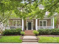 Two-story house with a front porch and landscaped yard at 3277 Richards Xing, Fort Mill, SC 29708