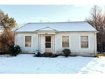 White house with snow covered yard at 2244 9Th Ne Ave, Hickory, NC 28601