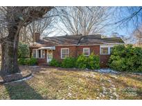 Brick house with mature landscaping and a spacious yard at 3513 Startown Rd, Newton, NC 28658