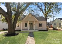 Charming craftsman home with front porch and landscaped lawn at 1314 Ordermore Ave, Charlotte, NC 28203
