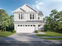 Two-story house with gray siding, white trim, and a two-car garage at Lot 10 Solitude Ct, Kannapolis, NC 28081