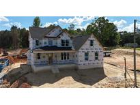 Two-story home featuring new construction and unfinished landscaping at 4251 Candlewood Dr, Sherrills Ford, NC 28673