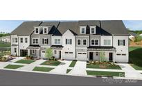 Front view of three townhouses with gray and white exterior, two-car garages, and landscaping at 3059 Finchborough Ct # 217, Charlotte, NC 28269