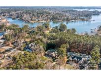 Stunning lakefront property with spacious homes and lush greenery at 574 Barber Loop, Mooresville, NC 28117