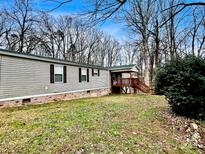 Side view of the mobile home, showing the length at 758 Shannon Meadows Rd, Clover, SC 29710