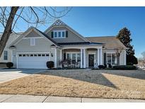Craftsman style home with a two-car garage and manicured lawn at 2087 Yellowstone Dr, Fort Mill, SC 29707