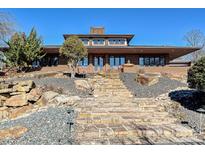Brick home with stone landscaping and tiered walkway at 172 Tuckertown Rd, New London, NC 28127