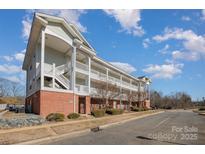 Brick multi-Gathering building with stairs and landscaping at 9261 Meadow Vista Rd, Charlotte, NC 28213