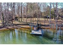 Aerial view of house with private dock on lake at 8163 Hope Dr, Denver, NC 28037