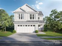 Two-story house with gray siding, white trim, and a two-car garage at Lot 18 Solitude Ct, Kannapolis, NC 28081