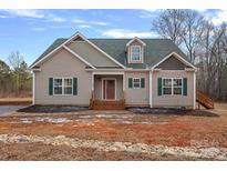 Newly constructed craftsman style home with a front porch and stone accents at 5605 Miami Ln, Concord, NC 28025