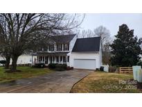 Two-story house with attached garage and front porch at 113 Rocky Trail Ct, Fort Mill, SC 29715