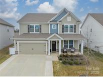 Two-story house with a neutral color palette and a two-car garage at 172 Longleaf Dr, Mooresville, NC 28117