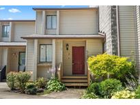 Charming townhouse featuring well-maintained landscaping and a cozy front entrance at 5190 Corbin Ln, Hickory, NC 28601
