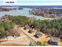 Stunning aerial view of lakeside community featuring craftsman-style homes near Lake Wylie at 5057 Spratt Rd, York, SC 29745