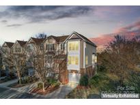 Attractive 3-story townhome with 2-car garage, nicely landscaped at 804 Skybrook Falls Dr, Huntersville, NC 28078