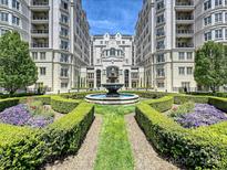 Elegant courtyard with fountain and manicured landscaping at 2823 Providence Rd # 154, Charlotte, NC 28211