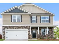 Two-story house with stone accents and a two-car garage at 3917 Coleman Dr, Charlotte, NC 28215