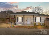 Charming one-story home with a covered porch and small yard at 535 5Th St, Chester, SC 29706