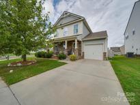 Two-story house with gray siding, brick accents, and a well-maintained lawn at 846 Von Buren Blvd, Rock Hill, SC 29730