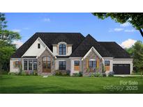 Craftsman style home with stone accents, a 3-car garage, and a landscaped lawn at 502 Sugar Maple Ln, Weddington, NC 28104