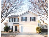 Two-story house with a white exterior, black shutters, and a two-car garage at 1866 Baylor Dr, Rock Hill, SC 29732