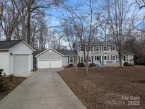 Charming two-story home with a two car attached garage and a detached single car garage at 2490 Westminster Dr, Rock Hill, SC 29732