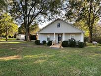 Ranch style home with a spacious yard at 3219 Harmon Rd, Lincolnton, NC 28092