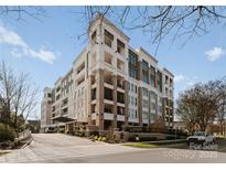 Luxury condo building with modern design and ample parking at 130 Cherokee Rd # 403, Charlotte, NC 28207