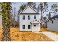 Two-story white house with gray trim and walkway at 205 Benfield Rd, Kings Mountain, NC 28086