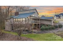 Lakefront home with expansive deck and stunning sunset views at 3910 6Th Nw St, Hickory, NC 28601