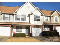 Attractive two-story townhome with landscaping at 11646 Rabbit Ridge Rd, Charlotte, NC 28270