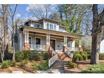 Craftsman style home with brick accents and a welcoming front porch at 2043 Shenandoah Ave, Charlotte, NC 28205