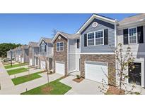 Exterior view of townhomes with stone and siding at 3156 Ora Smith Rd, Lincolnton, NC 28092