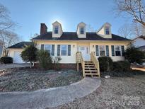 Beautiful two-story home with a charming front yard at 3462 Lake Shore S Dr, Denver, NC 28037