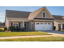 Attractive Craftsman style home with stone accents and a two-car garage at 417 Spring Arbor Ave, Salisbury, NC 28146