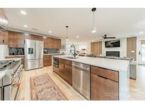 Modern kitchen with stainless steel appliances and an island at 531 Manhasset Rd, Charlotte, NC 28209