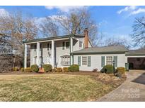 Ranch style home with mature landscaping and a spacious yard at 1968 12Th Street Ne Pl, Hickory, NC 28601