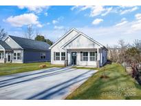 Newly constructed home with a gray exterior and a paved driveway at 126 Wylie St, Rock Hill, SC 29730