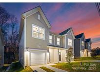 Charming home featuring a two-car garage, landscaped yard, and craftsman-style details at sunset at 3110 Amay James Ave, Charlotte, NC 28208