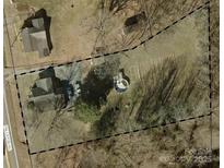 Aerial view of house, driveway, and backyard with above-ground pool at 4136 Fallston Rd, Shelby, NC 28150