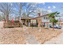 Ranch style home with brick facade and attached deck at 400 Charles St, Spencer, NC 28159