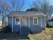 Charming one-story home featuring a light blue exterior and covered porch at 736 Cauthen St, Rock Hill, SC 29730