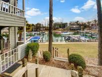Lovely waterfront view of marina with boats and calm waters at 237 Northwest Dr, Davidson, NC 28036