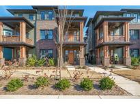 Three-unit townhome development showcasing craftsman style architecture and front yards at 339 East Blvd, Charlotte, NC 28203