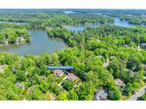 Aerial view of house near lake, highlighting waterfront location at 908 Thorn Ridge Ln, Lake Wylie, SC 29710