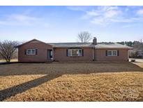 Charming brick ranch home with a well-maintained lawn and a classic, inviting facade at 760 Bethesda Rd, Statesville, NC 28677