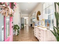 Inviting foyer with beautiful hardwood floors and elegant decor, leading to a bright and spacious home at 1575 Riverwalk Pkwy, Rock Hill, SC 29730
