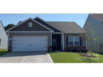 Charming house with gray siding, white garage door, and landscaped lawn at 1578 Doran Ter, Richburg, SC 29729